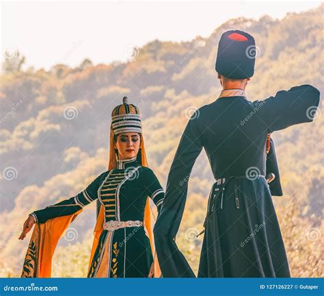 A Guy with a Girl in Traditional Circassian Clothes Dancing at the Festival of Adyghe Cheese in ...