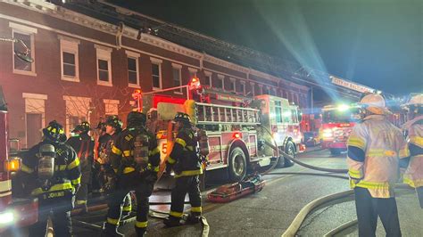 Firefighters battle wind-whipped fire early this morning in East Baltimore