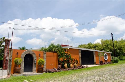 Mexican House On Cobblestone Street Stock Image - Image of street, blur ...