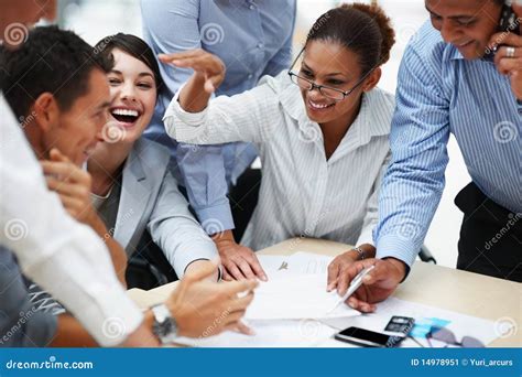 Stock Image: Smiling business people working together. Image: 14978951