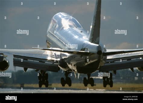 Boeing 747-400 landing showing flaps and undercarriage at touchdown on the runway Stock Photo ...