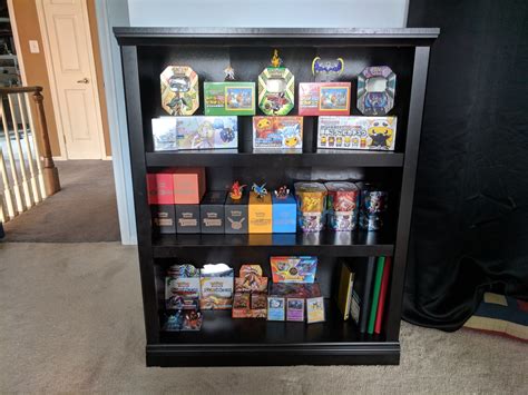 Finally put together a bookshelf display for my Pokemon cards! (More ...