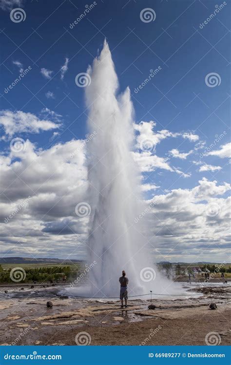 Erupting geyser editorial photography. Image of nature - 66989277