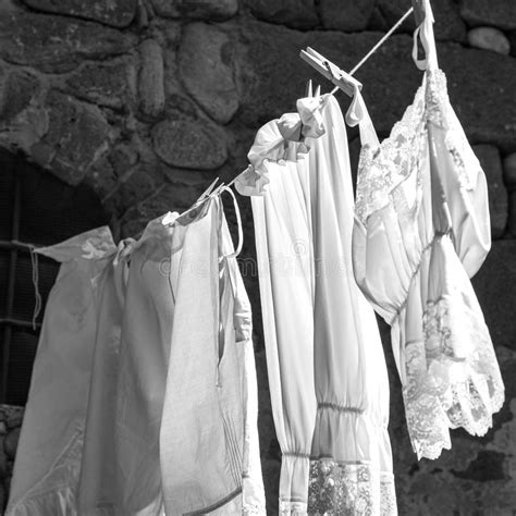 Hanging White Fresh Washed Clothes Stock Photo - Image of cotton, glamour: 123813020