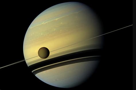 Lakes on Saturn's Largest Moon Titan Shaped by Waves, Scientists Say - Newsweek