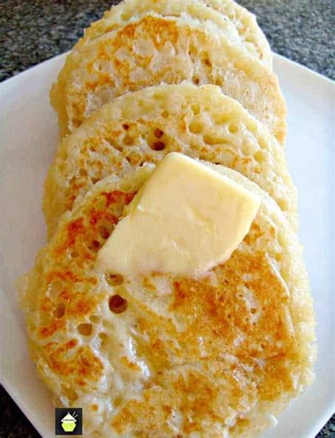 Perfect Warm Crumpets, a delicious British recipe, often served at breakfast time, toasted with ...