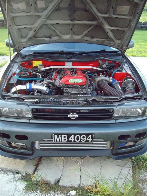 the engine compartment of a car with its hood open