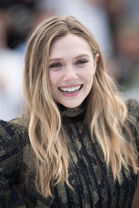 ELIZABETH OLSEN at Wind River Photocall at 2017 Cannes Film Festival 05 ...