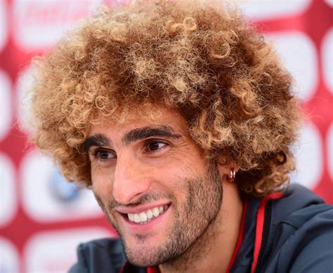 Manchester United star Marouane Fellaini used to have short hair ...