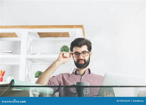 Smiling man using laptop stock image. Image of attractive - 97816247