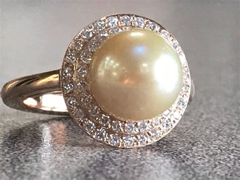 Golden South Sea Pearl ring set in a double diamond halo | Etsy