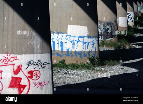 A graffiti art under an overpass bridge Stock Photo - Alamy