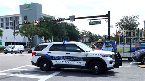 Gainesville police officers respond to two drive-by shootings