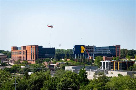 Michigan football stadium gets new lights delivered by helicopter ...