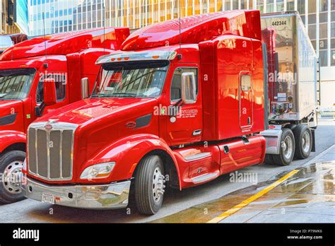 New York, USA- September 09, 2017 : Large American truck trucker and urban cityscape of New York ...