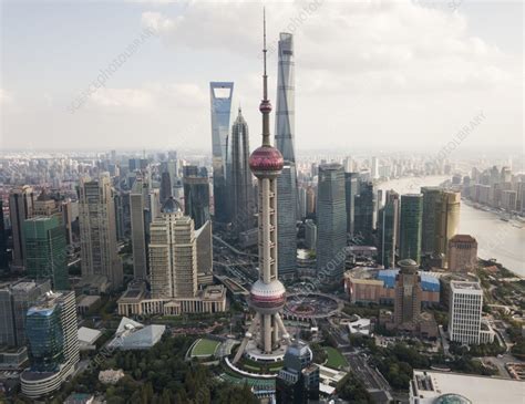 Aerial view of skyline and passing river, Shanghai, China - Stock Image ...