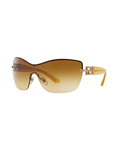 Versace Sunglasses in Gold | Lyst