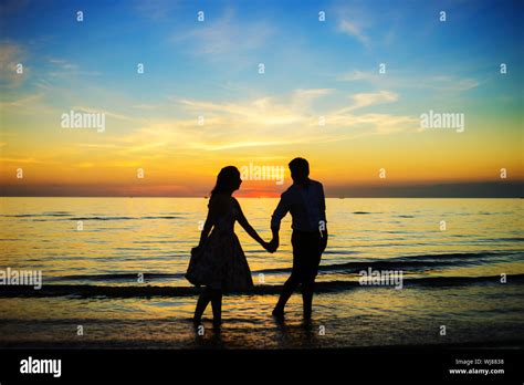 Two hands silhouette hi-res stock photography and images - Alamy