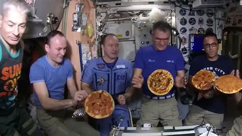 Watch astronauts enjoy pizza in zero gravity - CNN Video