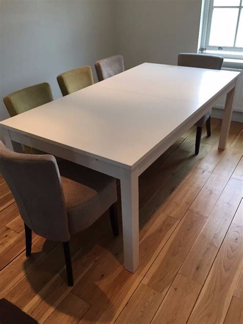 Ikea white dining table seating 8 (extendable to 12) | in South West London, London | Gumtree