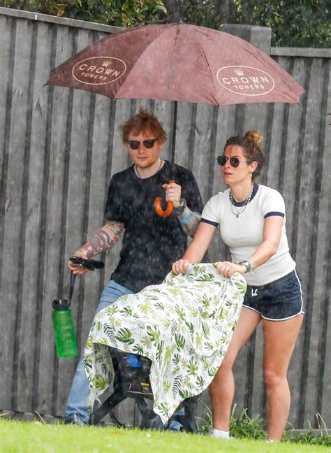 Ed Sheeran and wife Cherry step out in rain with baby girl