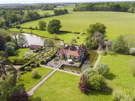 This grand former rectory sits within its very own moat | Farm house living room, Cool rooms ...