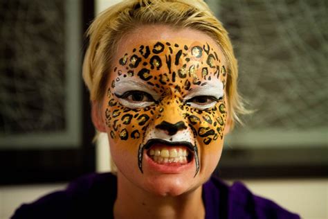 Pin by Hallie Edlund on BLACK CAT Face Painting | Black cat face paint, Kitty face paint, Cat face