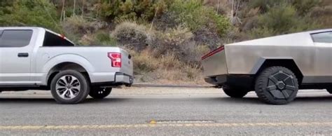 Watch Tesla Cybertruck in tug of war against Ford F150 and size ...