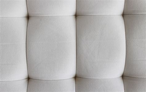 Premium Photo | Quilted cushion texture background, closed up, horizontal