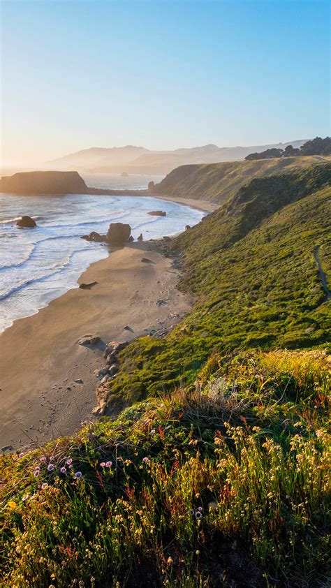 Sunset over Blind Beach and Goat Rock in the Sonoma Coast State Park ...