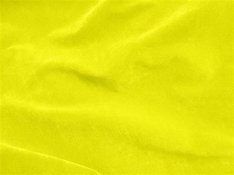 Yellow velvet fabric texture used as background. Empty yellow fabric ...