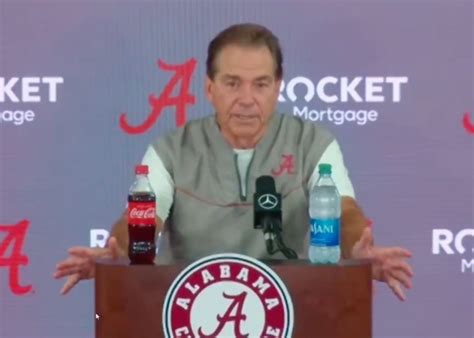 Baby crashes Nick Saban press conference, Nick Saban handles it in most ...