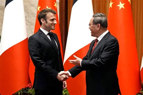 Macron Meets China’s Li Qiang as EU Talks Begins in Beijing