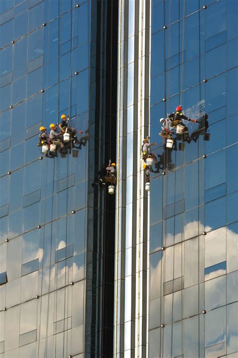 Skyscraper window washers | Free Stock Photo | LibreShot
