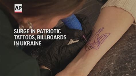 Patriotic tattoos, billboards popular in Ukraine | wbir.com