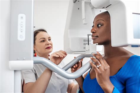 Dental Xray Procedure For A Black Female Patient Stock Photo - Download ...