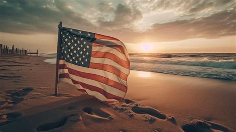 Premium AI Image | An american flag on the beach at sunset