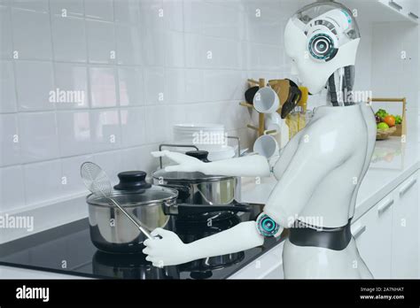 cooking robot artificial intelligence to cook food in futuristic concept Stock Photo - Alamy