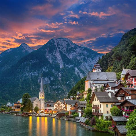 Hallstatt village in the Alps at dusk - TouCanvas | Hallstatt, Village, Places to travel