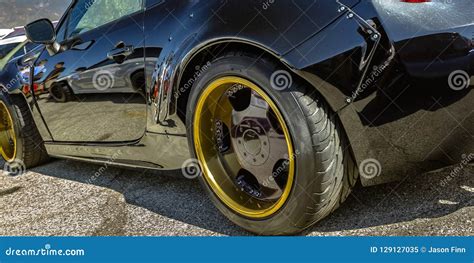 Black Car with Gold Wheel Rim and Black Spokes Stock Image - Image of detailing, glassy: 129127035