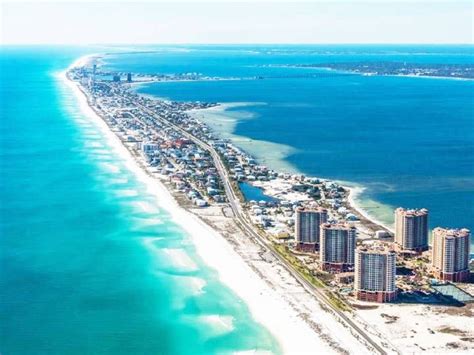 Pensacola Beach is a Florida resort community on the Gulf Coast barrier island of Santa Rosa. It ...