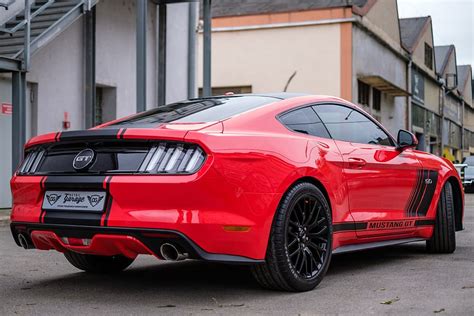 HD wallpaper: red and black Ford Mustang GT parked near white and gray ...