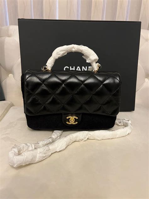 Chanel black flap bag with top handle lambskin 2023, Luxury, Bags & Wallets on Carousell