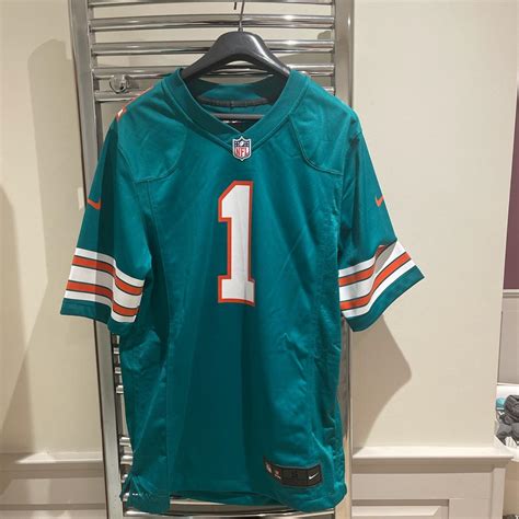 Miami Dolphins NFL throwback home jersey. Tua... - Depop