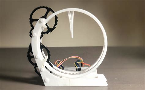 Holo Clock is a novel 3D-printed clock that tells time using a pair of rotating rings | Arduino Blog