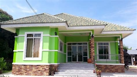 Bungalow with an Impressive Exterior Color and Roofs - House And Decors