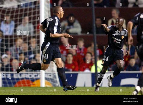 Real madrids ronaldo celebrates scoring with teammate claude makelele hi-res stock photography ...