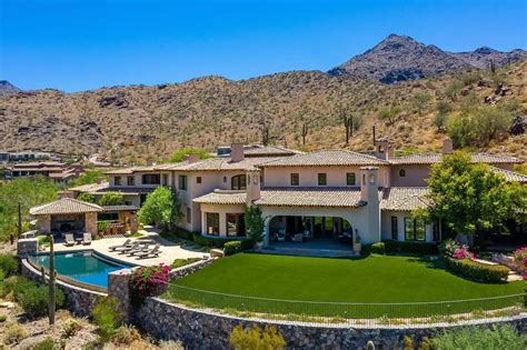 Experience Timeless Elegance and Tranquility at This Stunning California-Style Estate in ...