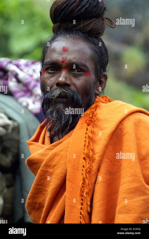 Old indian yogi sadhu holy walking at Khirganga hot springs in Parvati ...