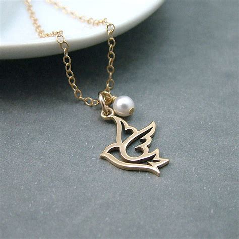 gold dove necklace by wished for | notonthehighstreet.com